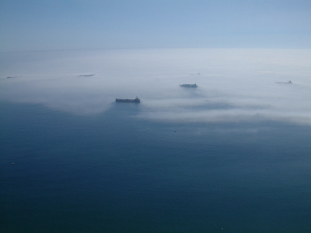 Ships in the mist in the Straits of Gibraltar